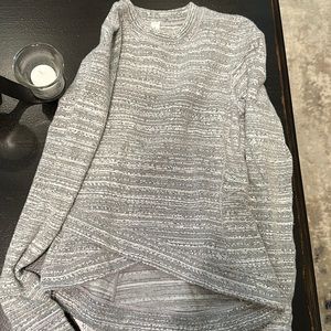 Lululemon fleece top size 2 has hand warmers and a back pocket